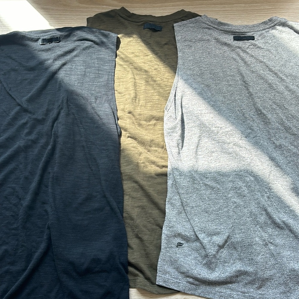 Men’s Fabletics tank top in black green and gray